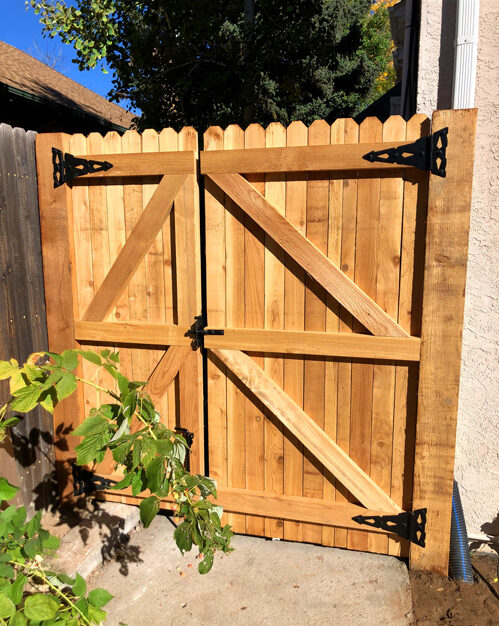 Cedar wood double swing gate in Denver, Colorado.