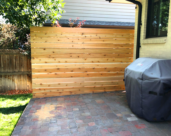 Modern horizontal cedar wood fence privacy screen in University neighborhood in Denver, Colorado.