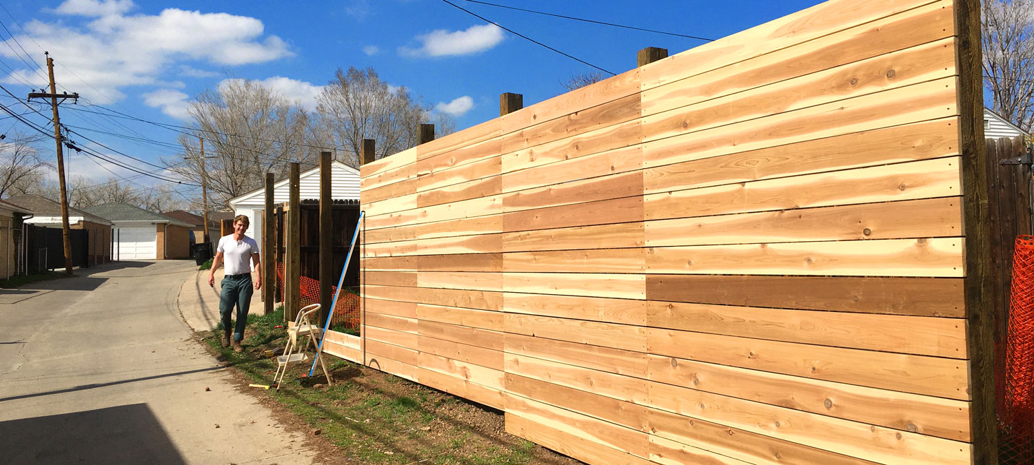 Modern or contemporary horizontal wood fence in Ruby Hill neighborhood in Denver, Colorado.