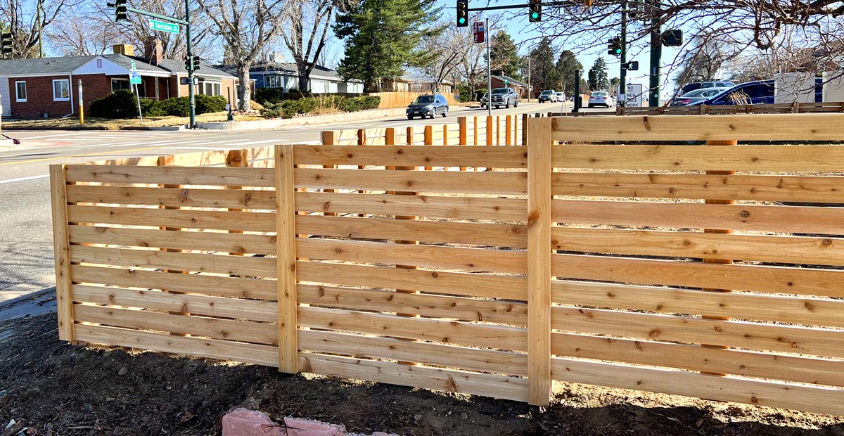 Modern horizontal wood front yard fence in Sloans Lake neighborhood in Denver, Colorado.