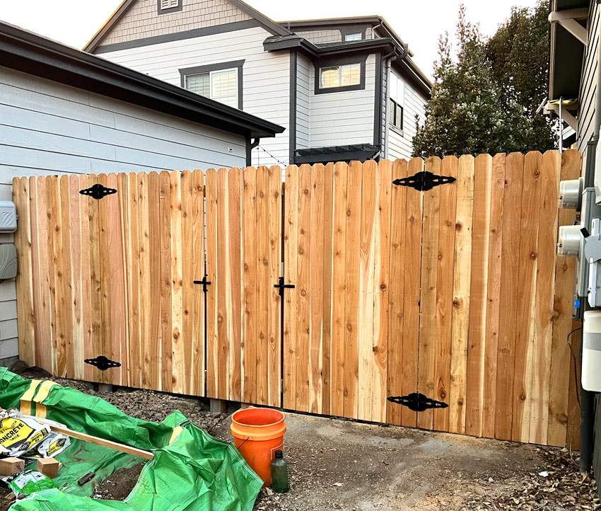 Secure alley fence gate in South Pearl neighborhood in Denver, Colorado.