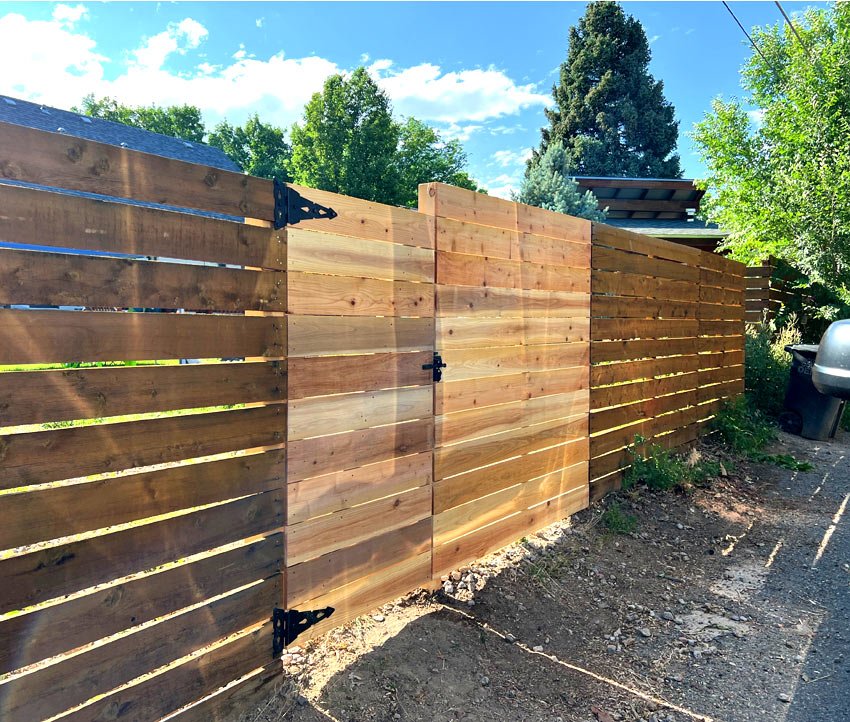 Wood horizontal style fence section repair in Denver, Colorado.